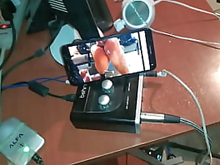 big tit asian ladyboy shows her sexy pics and takes off her top for a photo shoot