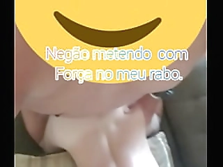 brunette ladyboy in white stockings strokes her small cock in bed