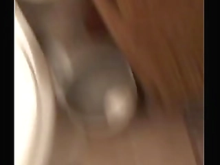 gorgeous blonde shemale flaunts black dress and masturbates