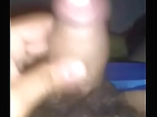 young petite ladyboy milks her tranny cock on camera