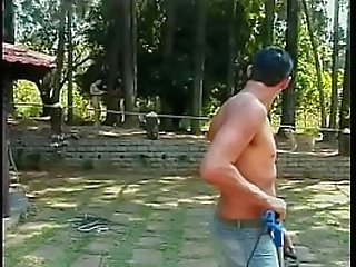 redhead ladyboy in grey skirt teases with her huge tits and