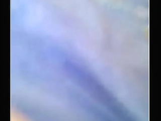 bon poses in her bright yellow panties