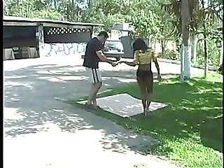 horny dude gets blown by an eager ladyboy before pounding her ass on the grass