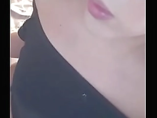 ladyboy stroking her hard cock on the living room couch