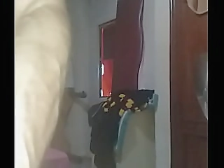 asian ladyboy in her white robe masturbates on camera